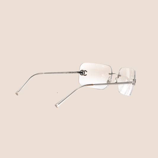 CHANEL CC CRYSTAL LOGO RIMLESS CLEAR SUNGLASSES