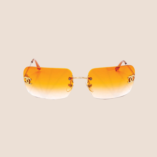 CHANEL 90s ORANGE CRYSTAL CC LOGO RIMLESS SUNGLASSES