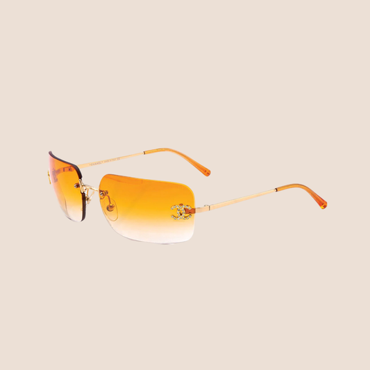 CHANEL 90s ORANGE CRYSTAL CC LOGO RIMLESS SUNGLASSES